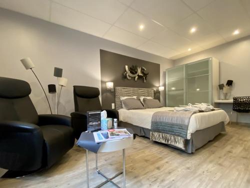Postel nebo postele na pokoji v ubytování Bethune City Relax Spa & Sauna