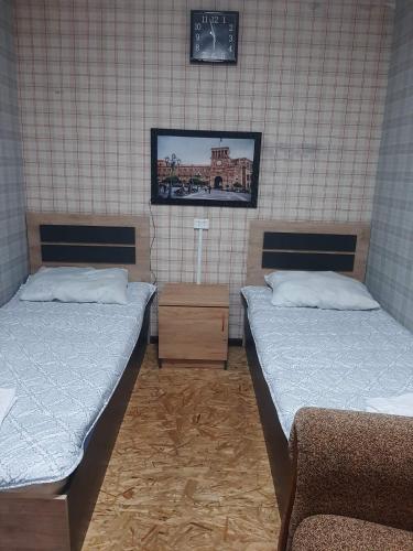 Llit o llits en una habitació de Shiraz