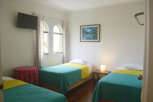 Postel nebo postele na pokoji v ubytování Casa Rodas