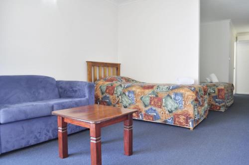 Un lugar para sentarse en Alexandra Park Motor Inn