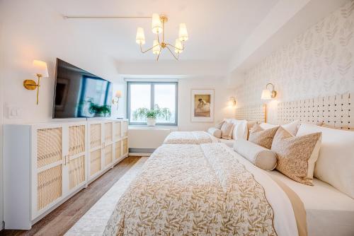 Katil atau katil-katil dalam bilik di Beautiful NYC Skyline Aparthotel for 6