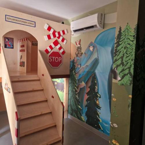 a toy room with a stop sign and stairs at Apartamenty IDA - Belle View in Szklarska Poręba