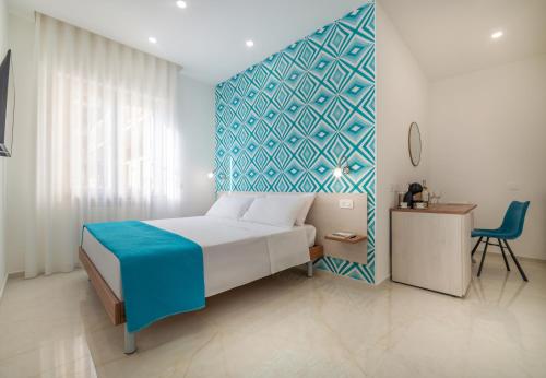 Postel nebo postele na pokoji v ubytování B&B Fiori D Arancio Sorrento