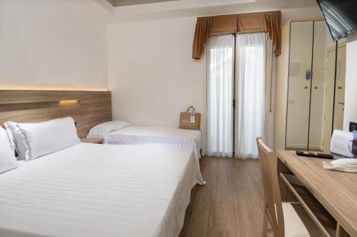 Hotel Estenseにあるベッド