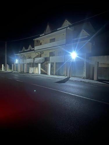 a building with lights on the side of a street at Bella vista 15A in Bianco