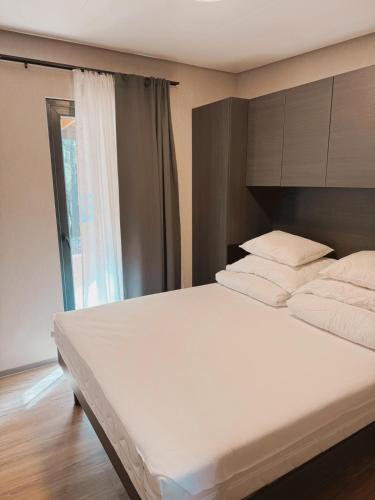 Postel nebo postele na pokoji v ubytování Vila Vesper