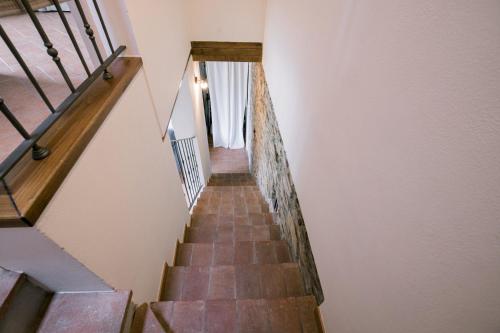 a stairway leading up to the second floor of a house at Tuscan Escape in Capannori