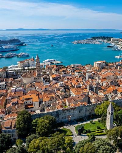 an aerial view of a city and the water at Digital Nomad Friends in Split