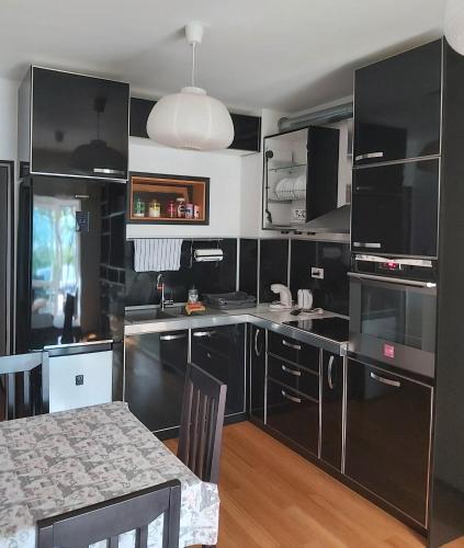 Kuchyň nebo kuchyňský kout v ubytování Diego