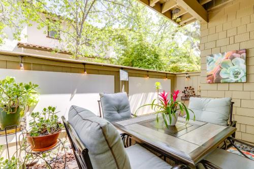 a patio with a wooden table and chairs at Private Patio and Workspace Quiet Sonoma Condo! in Sonoma