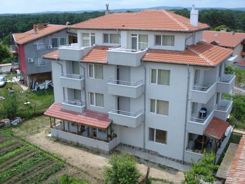 an aerial view of a building with red roof at Prestige in Sinemorets