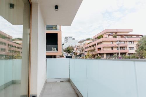 a balcony with a view of a city at Evo Residence Taietura Turcului in Cluj-Napoca