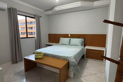 Postel nebo postele na pokoji v ubytování Apê amplo climatizado | Shopping e praia a 150m