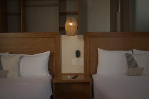Postel nebo postele na pokoji v ubytování Joanza by ÓOL Hotels