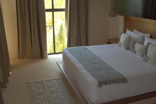 Postel nebo postele na pokoji v ubytování Joanza by ÓOL Hotels