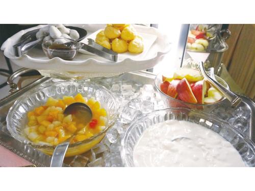 a buffet with fruits and other food on a table at Hotel AreaOne Chitose - Vacation STAY 99764v in Chitose