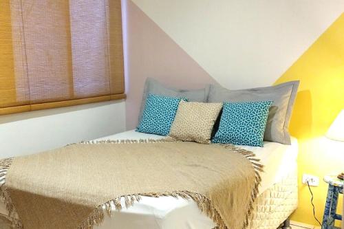 Postel nebo postele na pokoji v ubytování Apartamento aconchegante no Bongi