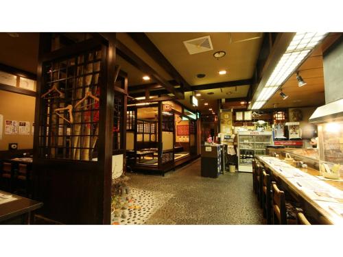 a store front of a restaurant with a counter at Hotel AreaOne Chitose - Vacation STAY 99771v in Chitose
