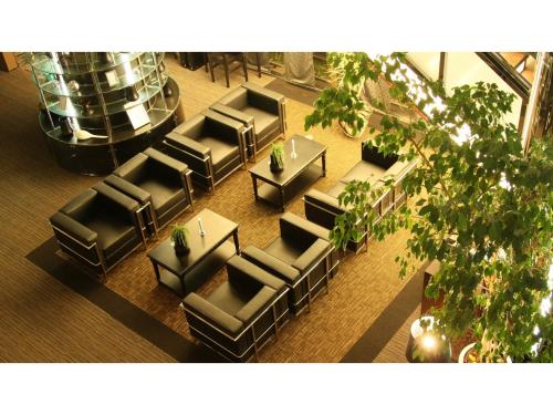 an overhead view of a restaurant with chairs and tables at Hotel AreaOne Chitose - Vacation STAY 99771v in Chitose