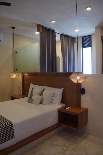 Postel nebo postele na pokoji v ubytování Joanza by ÓOL Hotels