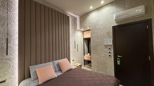 Posteľ alebo postele v izbe v ubytovaní Tropicana Room