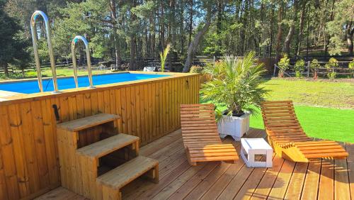 Πισίνα στο ή κοντά στο VIP VILLAGE Las Woda Rower - Podgrzewany Basen, Balia, Sauna