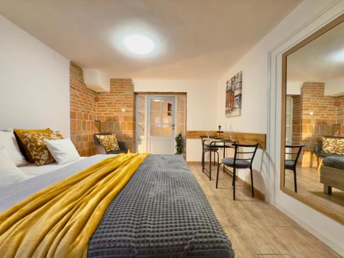 Ένα ή περισσότερα κρεβάτια σε δωμάτιο στο Hangulat apartman