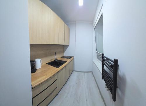 Una cocina o cocineta en Apartament Patio Antresol 1 Świnoujście