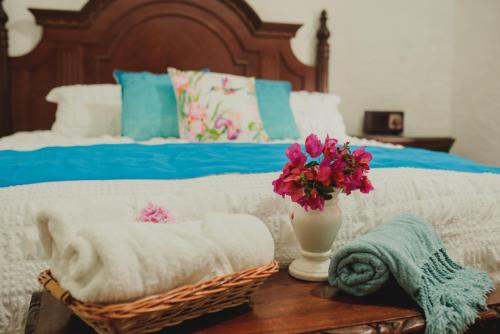 Una cama o camas en una habitación de Hacienda de Comodejé