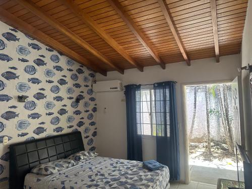 Postel nebo postele na pokoji v ubytování Casa el Pozo Playa el Agua