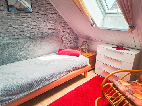 Giường trong phòng chung tại Lütt Matten