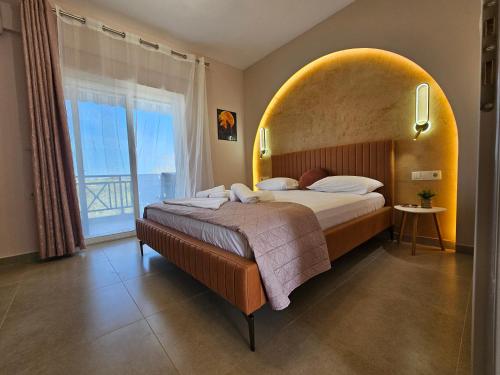 Ένα ή περισσότερα κρεβάτια σε δωμάτιο στο Holiday House 1- Kallithea Halkidiki