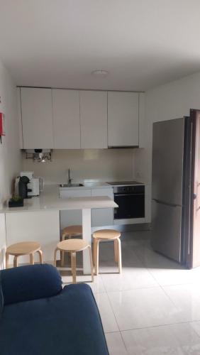 Η κουζίνα ή μικρή κουζίνα στο Costa Guest House