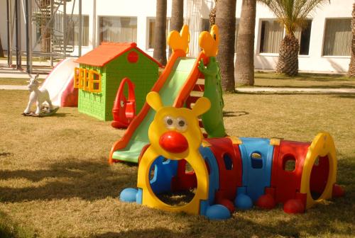 a childs toy train in a park at Le Bleu Hotel & Resort Kusadasi in Kusadası