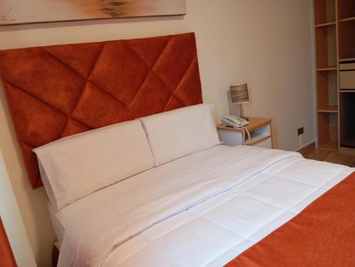 Ένα ή περισσότερα κρεβάτια σε δωμάτιο στο Hotel Soul Mate Inn