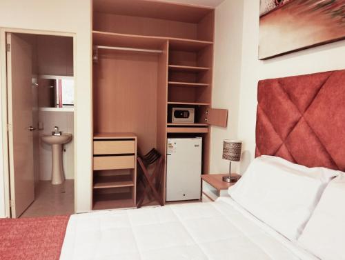 Ένα ή περισσότερα κρεβάτια σε δωμάτιο στο Hotel Soul Mate Inn