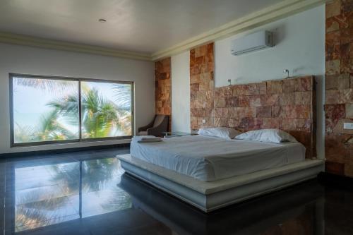 Una cama o camas en una habitación de Casa de playa Pams
