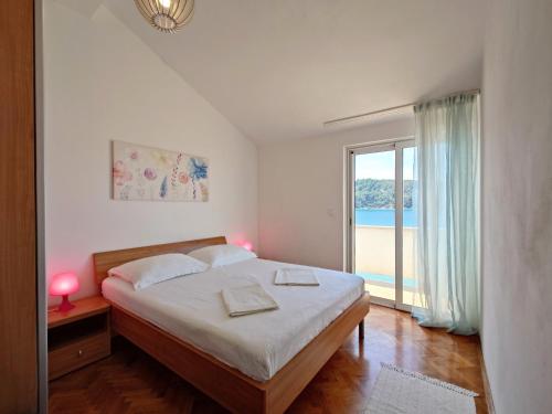 Apartments by the sea Kampor, Rab - 15310
