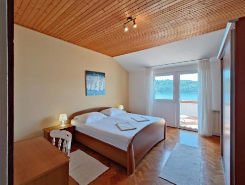 Apartments by the sea Kampor, Rab - 15310