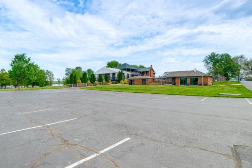 an empty parking lot with houses in the background at Resort Condo on Smith Mtn Lake Linens Included! in Moneta