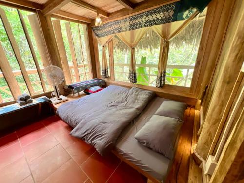 Katil atau katil-katil dalam bilik di Dao House