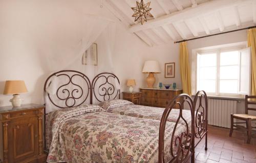 Tempat tidur dalam kamar di Villa Casetta