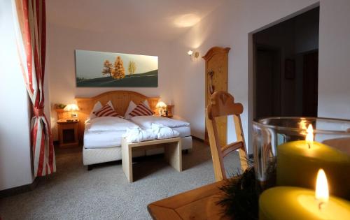 Uma cama ou camas num quarto em Romantic Hotel Excelsior