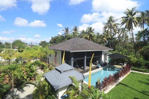 an aerial view of a villa with a swimming pool at Villa Beau Rivage in Bachok