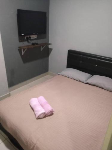 Postel nebo postele na pokoji v ubytování Ho Hotel Block C