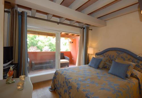 Postelja oz. postelje v sobi nastanitve Baglioni Resort Alleluja