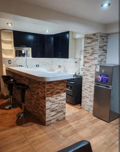 Køkken eller tekøkken på Las Margaritas Apart Rent