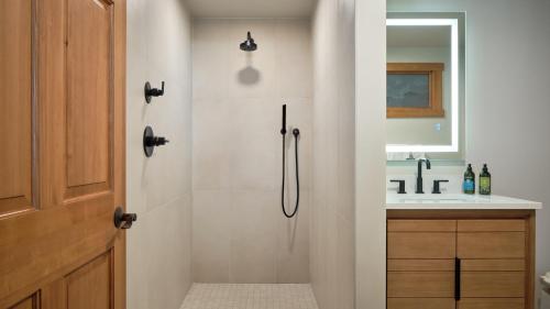 a bathroom with a shower and a sink at Landhaus Erika in Leavenworth