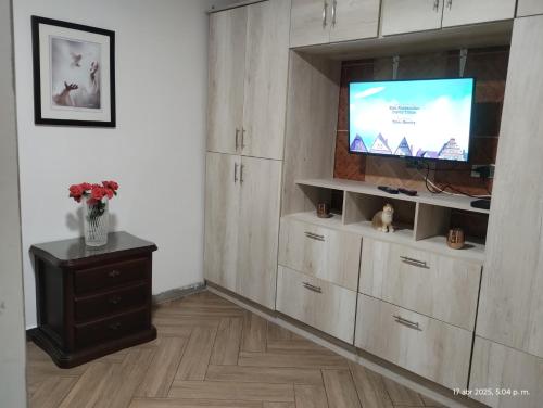 TV a/nebo společenská místnost v ubytování Casa Hévenie, Hospedaje familiar cómodo y bien ubicado