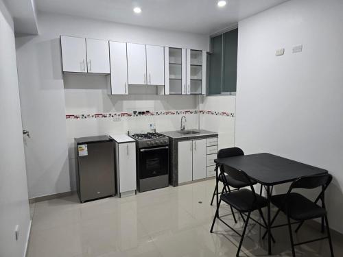 Kuchyň nebo kuchyňský kout v ubytování 402 Moderno departamento equipado